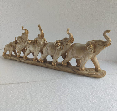 Creamish Elephant Bunch Polyresin Table Decor Showpiece - Craftkriti