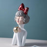 Polyresin Golden Apple Doll Table Decor Showpiece - Craftkriti